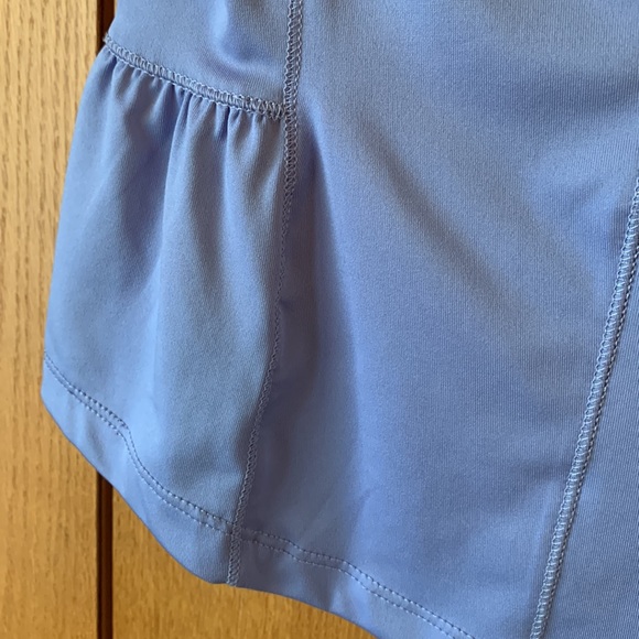 ANNIKA MEDIUM Cutter and Buck blue ruffle hem sleeveless sport top shirt EUC - Picture 9 of 9